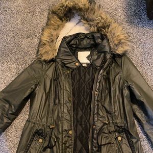 Women’s winter coat from Maurice’s in the color olive green in the size Medium